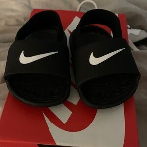 Nike Kids Black Slide Sandals with White Logo